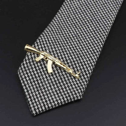 Men's tie clip, gun theme