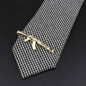 Men's tie clip, gun theme