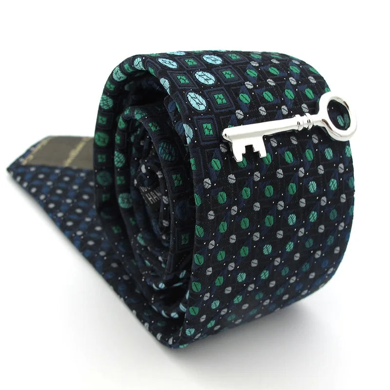 Men's tie pin holder, brass, available in different variations