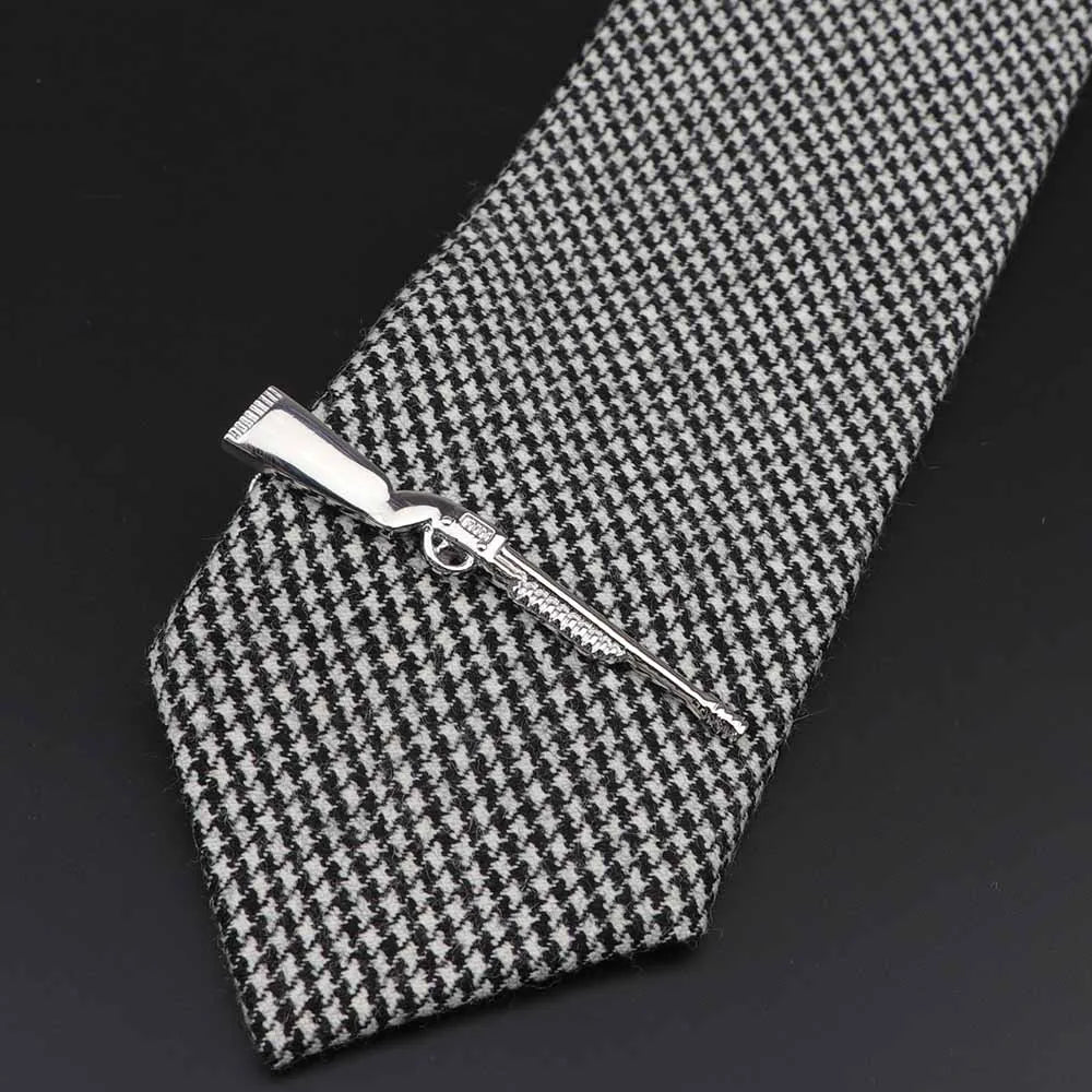 Men's tie clip, gun theme