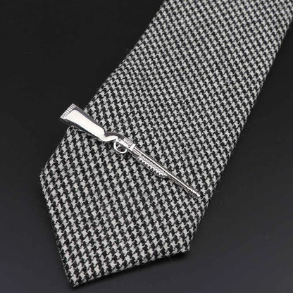 Men's tie clip, gun theme