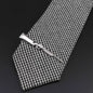 Men's tie clip, gun theme