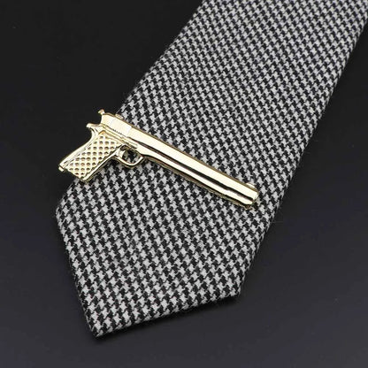 Men's tie clip, gun theme
