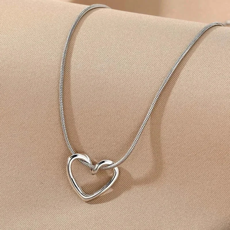 Hollow heart pendant necklace for women, available in different variations