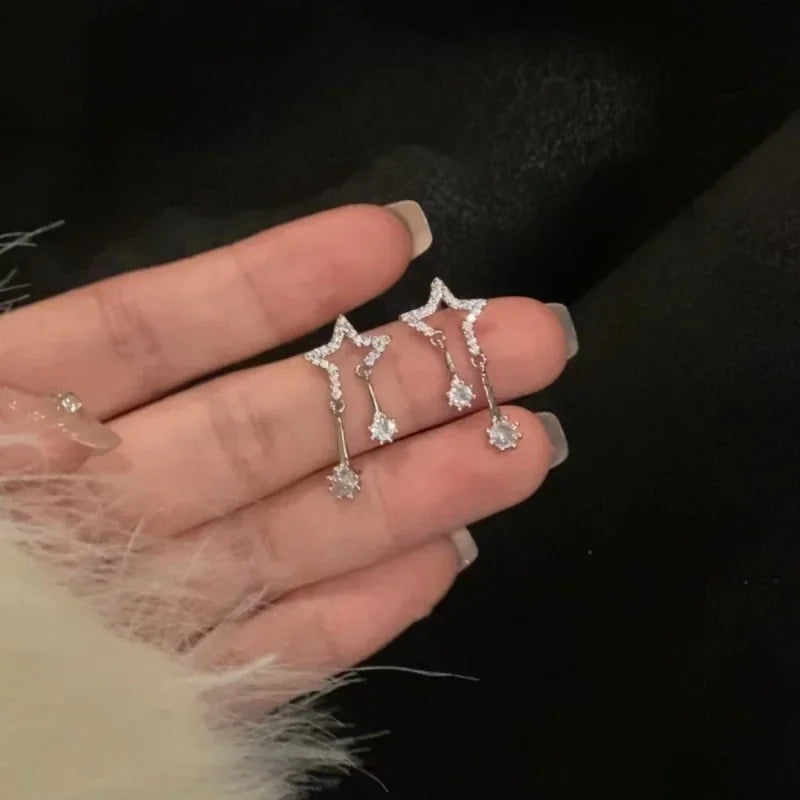 Star stud earrings with zirconia stones and tassels, trendy silver design