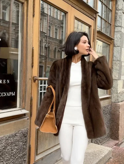 Luxurious faux fur coat for women, stylish lace trim detail