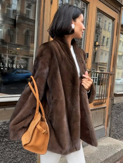 Luxurious faux fur coat for women, stylish lace trim detail