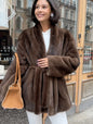 Luxurious faux fur coat for women, stylish lace trim detail