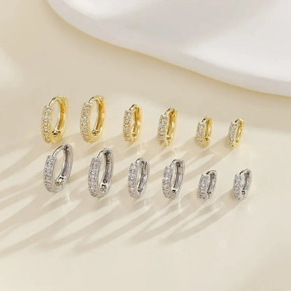 925 Hopea pienet Huggie rengaskorvakorut 14k kultapinnoiteella ja zirkoniakivillä